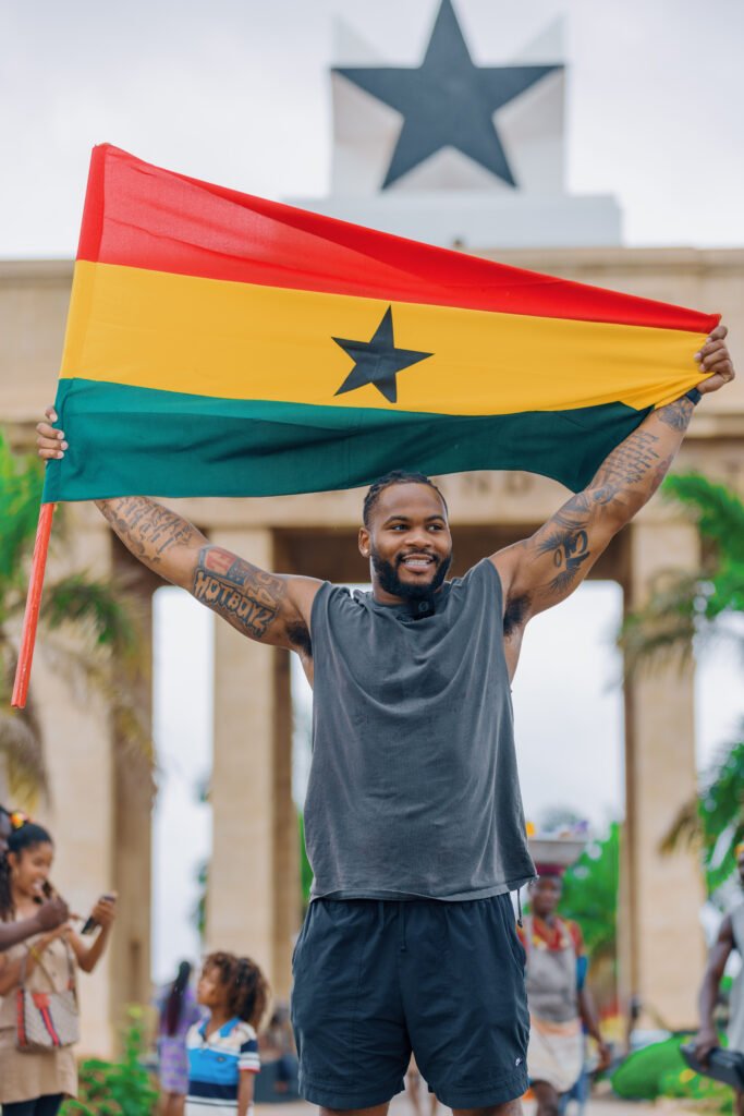 Sam Williams at the Independence Arch in Accra during his NFL Offseason Trip